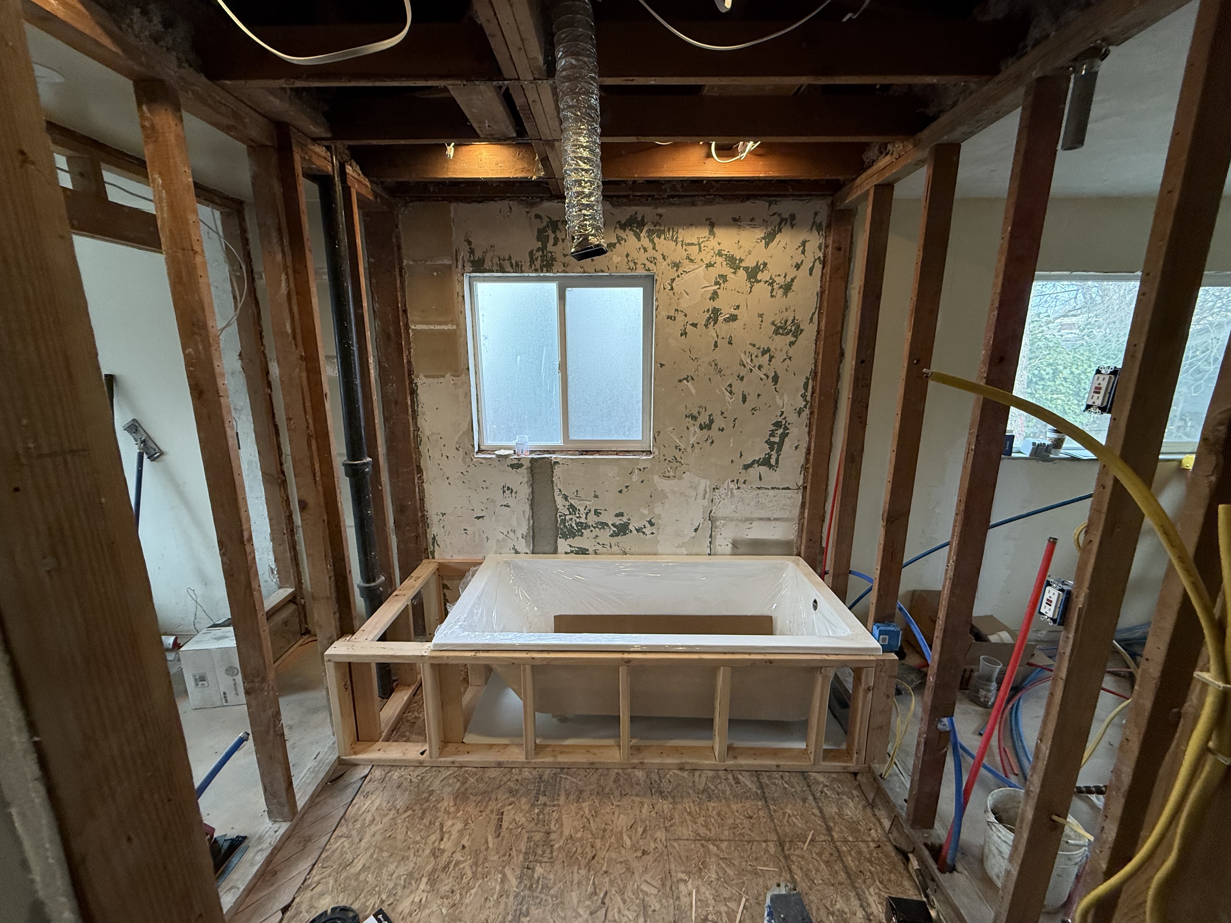 Bathtub framed with new tub in place